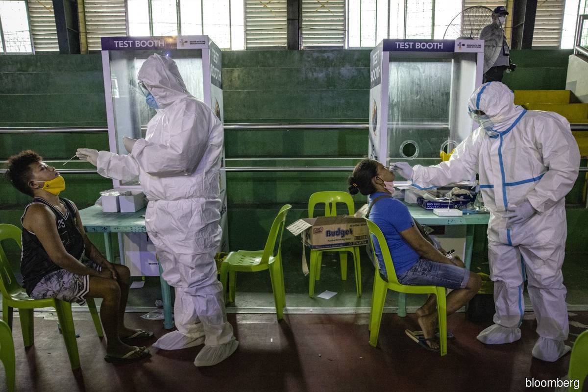 Philippines pins hopes for early vaccine access on China, Russia